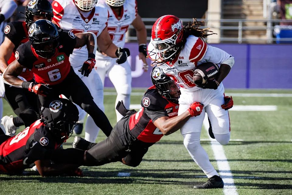 Calgary Stampeders defeat Ottawa Redblacks to keep playoff hopes alive