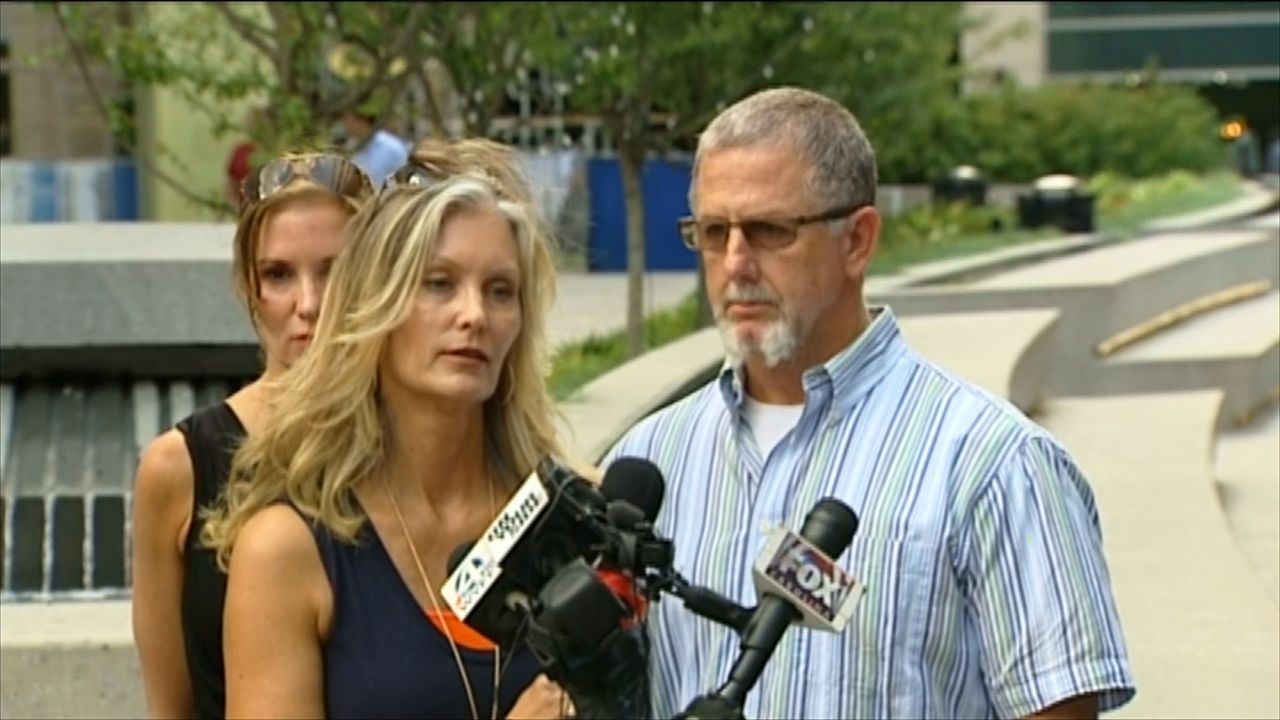 Family of teen shot by police will learn officers' names under court deal