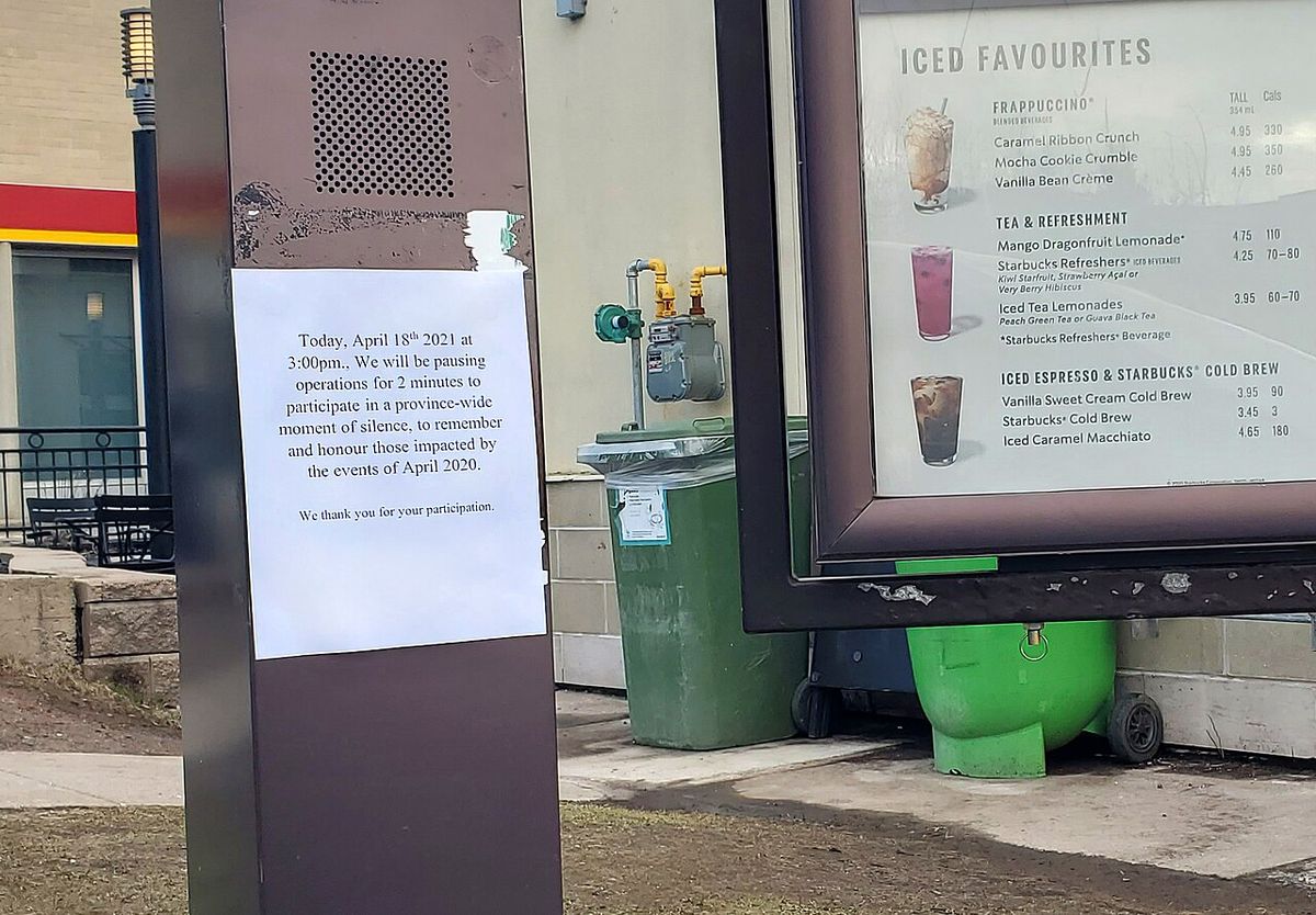 Sign at a Starbucks drive-through in Halifax on April 18, 2021, indicating that operations will pause for a province-wide moment of silence