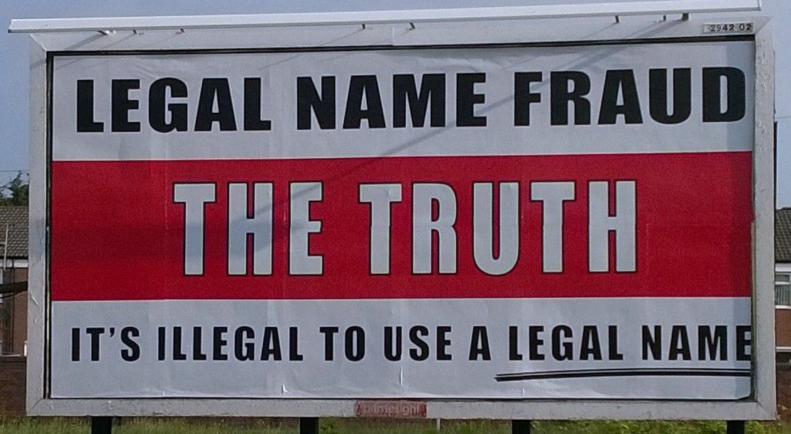 Billboard promoting the sovereign citizen "legal name fraud" trope.