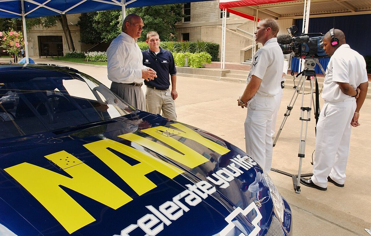 Arlington, Va. (Aug. 11, 2003) -- National Football League (NFL) Hall of Fame quarterback, Terry Bradshaw (left) and NASCAR Busch Series Dri
