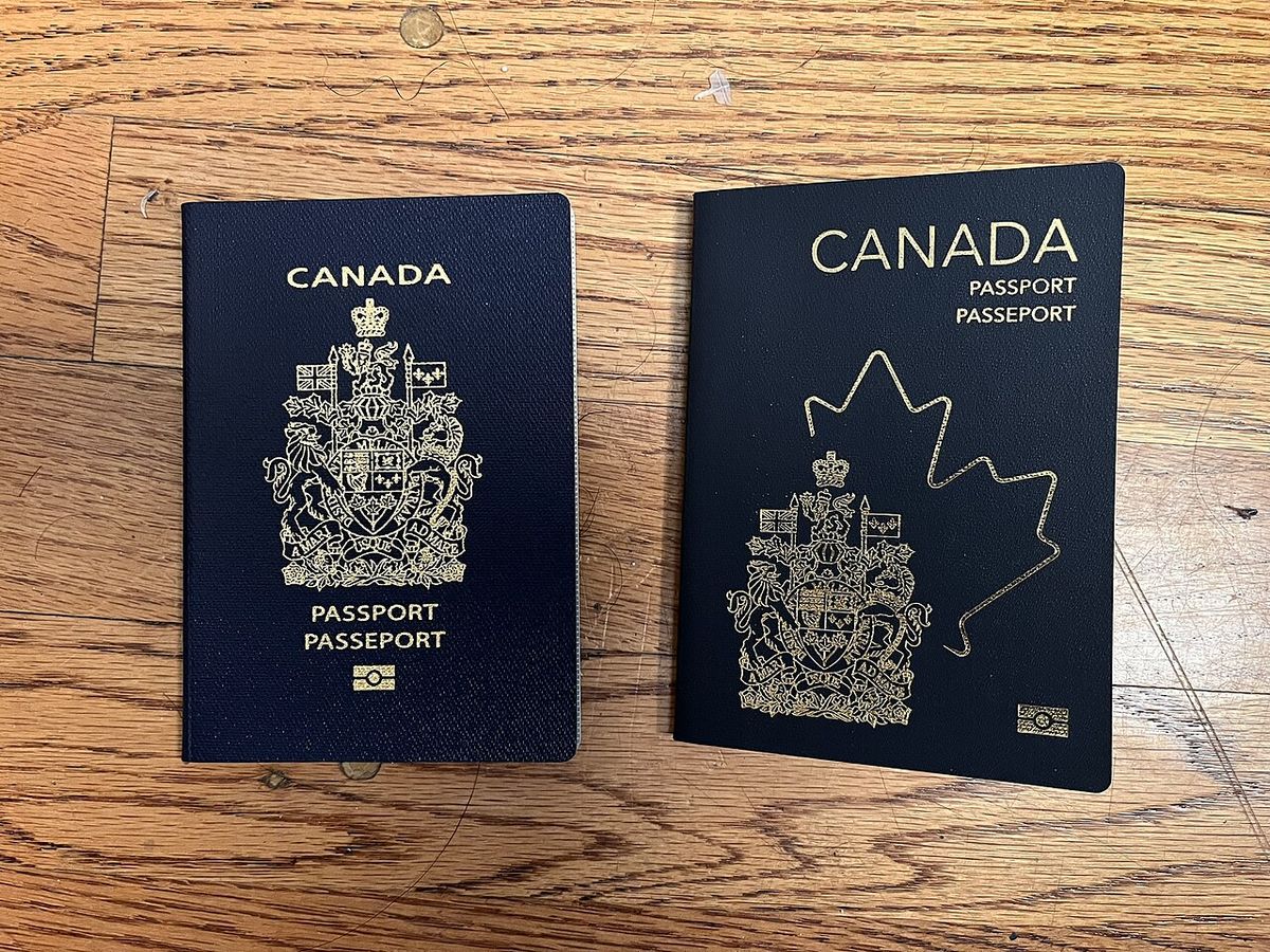 Canadian passports from old and new series.