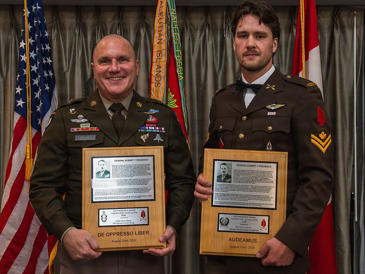 U.S. Army Command Sgt. Maj. Iztvan Mezei and Canadian Army Master Cpl. Evan Coopman, assigned to the Canadian Special Operations Regiment, p