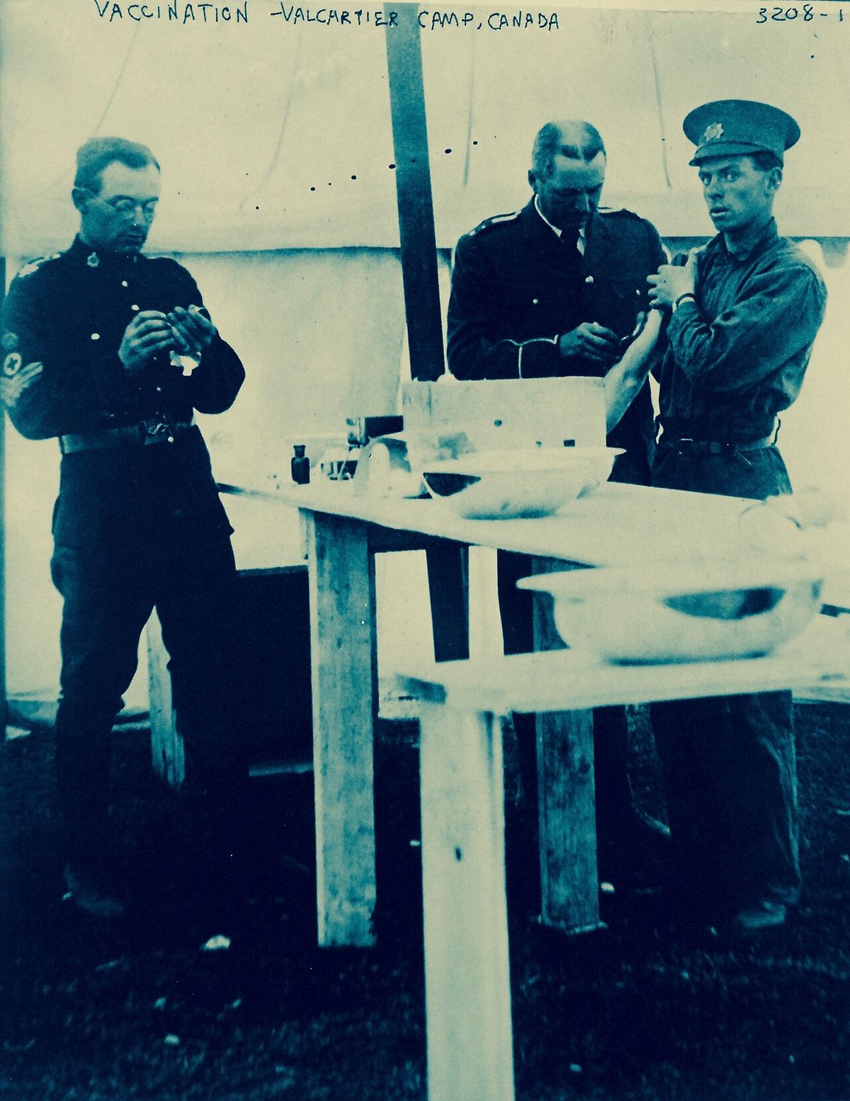 Lot-11178-1-3: WWI-Allies: Canadian Activities: Vaccination, Valcartier Camp, Canada. George C. Bain Collection. Courtesy of the Library of