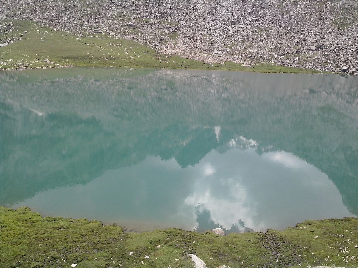 This Image has been captured at a height of 7000ft above sea level. its a natural lake having a crystal clear water to act like a mirror bes