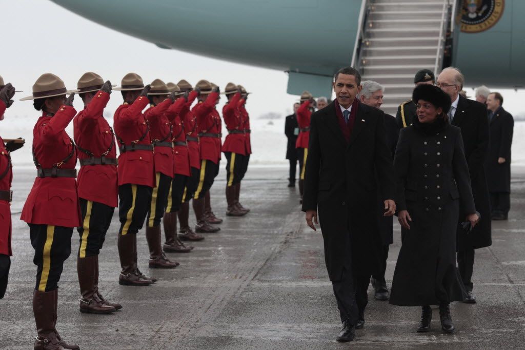 President Barack Obama is welcomed to Canada by Governor General Michaëlle Jean and a contingent of Royal Canadian Mounted Police.