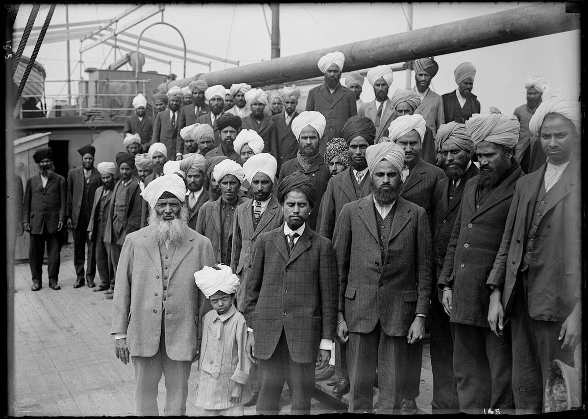 Sikhs aboard Komagata Maru. Gurdit Singh wearing light colored suit, white beard on left VPL Accession Number: 6231 Date: May 23 to July 23,