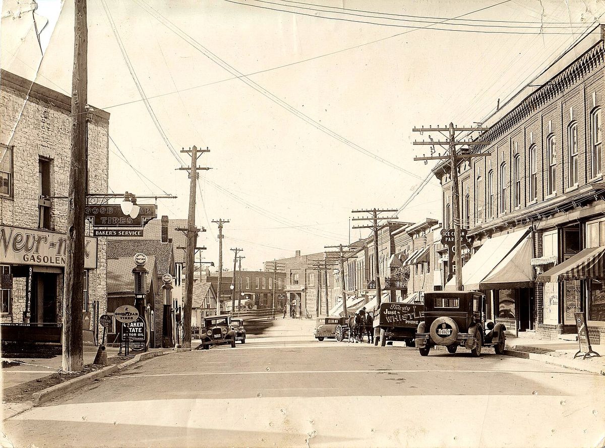 Looking southeast on Mill Street, Stirling, Ontario, with a service station and gasoline pumps on the left. Transferred from the Township of