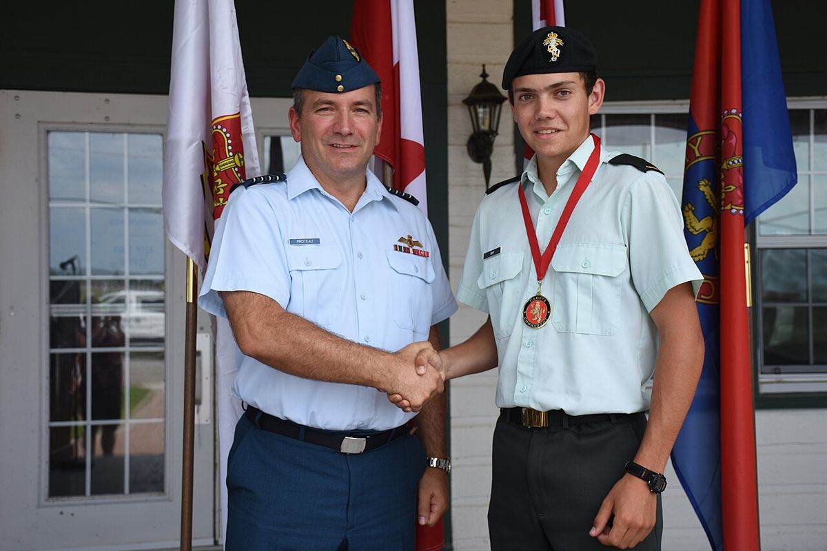 Cadet Ian Guy from 2332 Royal Canadian Army Cadet Corps is presented with the Best Overall Cadet Medal.