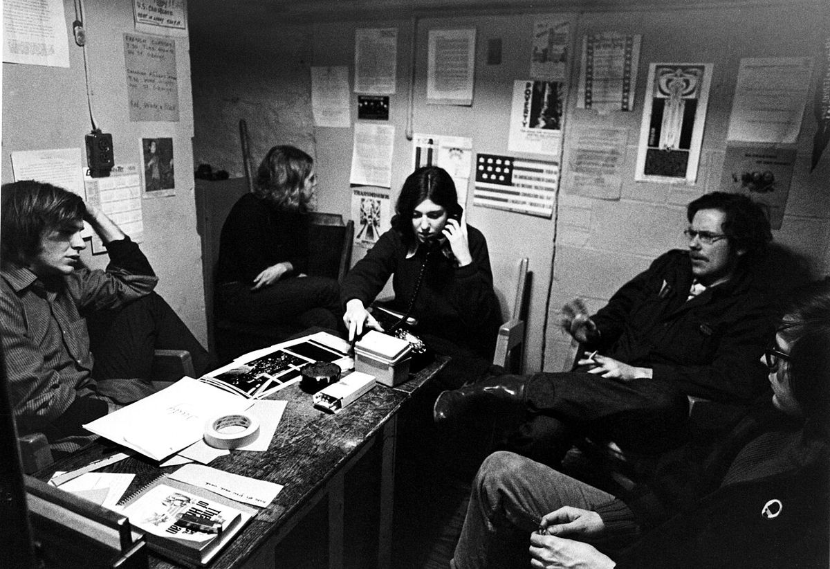 Draft-age Americans being counseled by Mark Satin (far left) at the Anti-Draft Programme office on Spadina Avenue in Toronto, August 1967. T