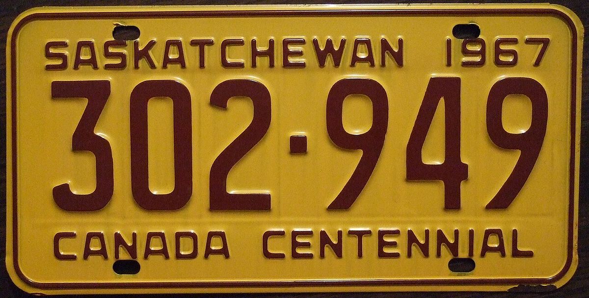 This unusually colored brown on yellow Saskatchewan 1967 plate was issued for Canada's 100th birthday. Once again the full year would be pla