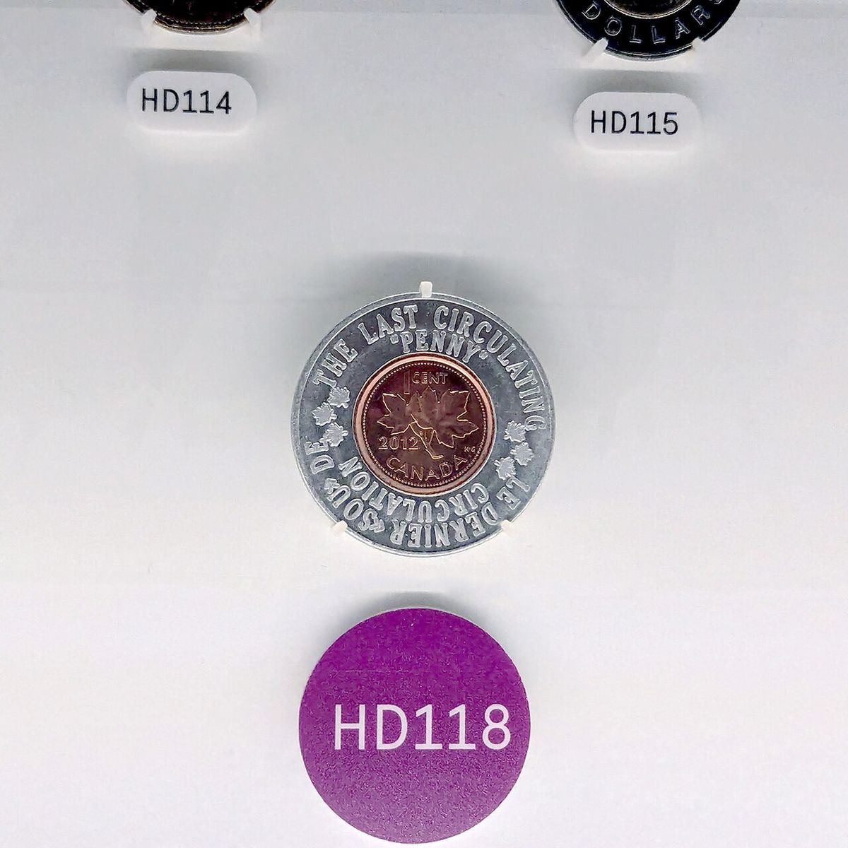 The last minted penny intended for circulation, produced at the Royal Canadian Mint in Winnipeg in 2012, on display at the Bank of Canada Mu