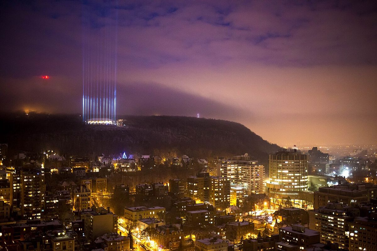 Commemorating the 25th anniversary of École Polytechnique massacre in Montreal. The 14 beams of light on Mount Royal represents 14 victims. 
