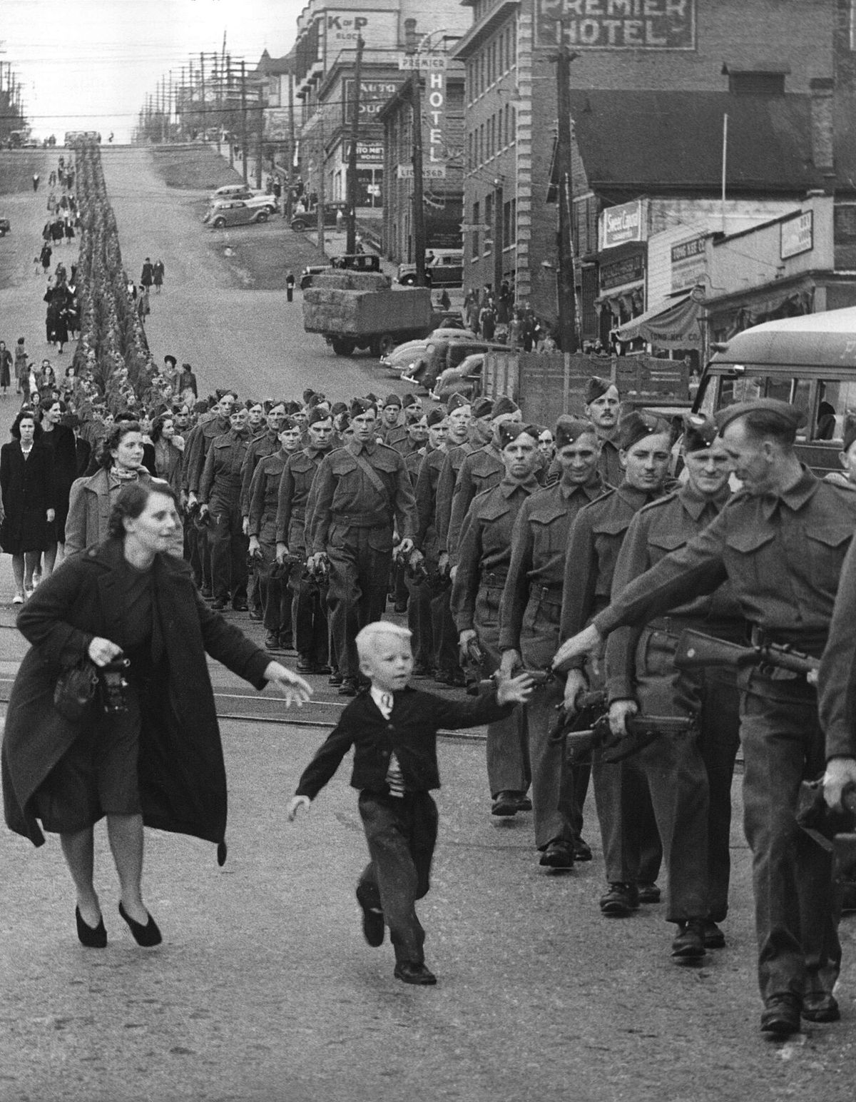 "Wait for Me, Daddy": British Columbia Regiment, DCO, marching in New Westminster, 1940 (LP 109).