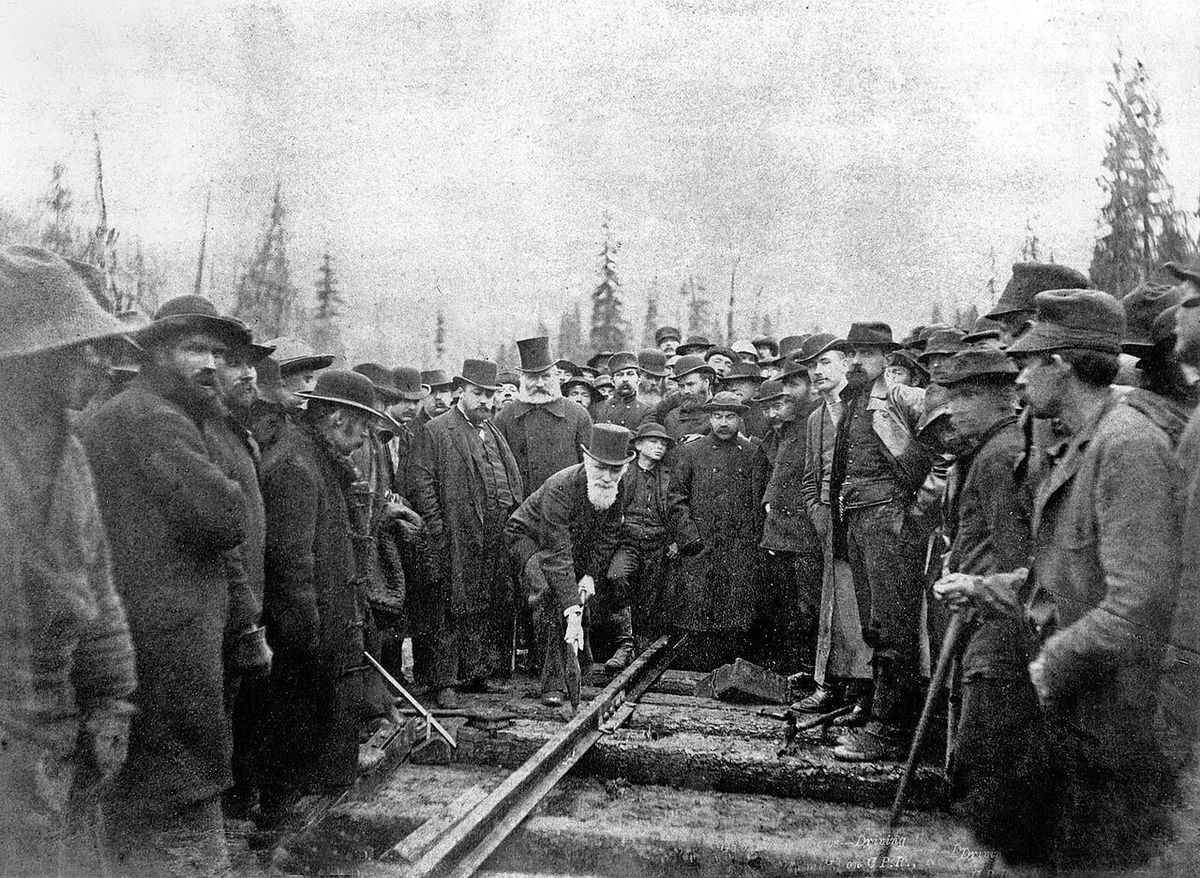 Last Spike of the CPR - Craigellachie, British Columbia, Canada. Donald Alexander Smith driving the last spike of the Canadian Pacific Railw