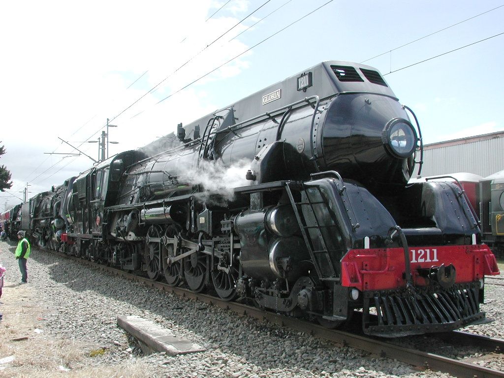 Front view of steam locomotive J 1211 at the 100 year anniversary of the North Island Main Trunk Railway, in Feilding, New Zealand, lined up