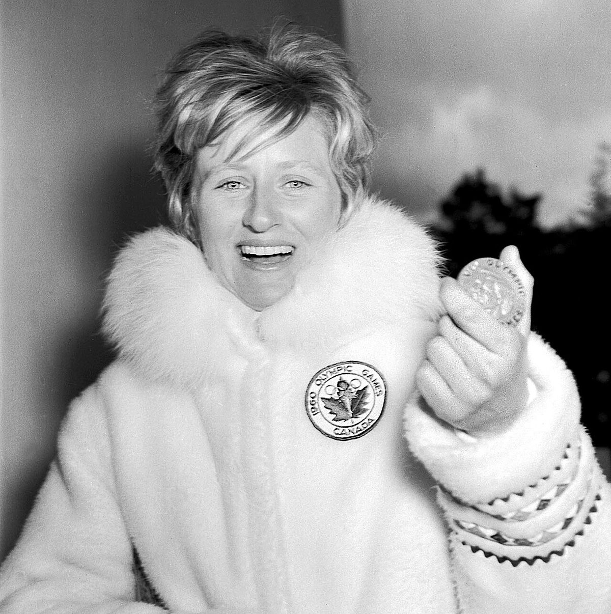 Miss Anne Heggtveit shows her skiing gold medal in slalom won in Squaw Valley