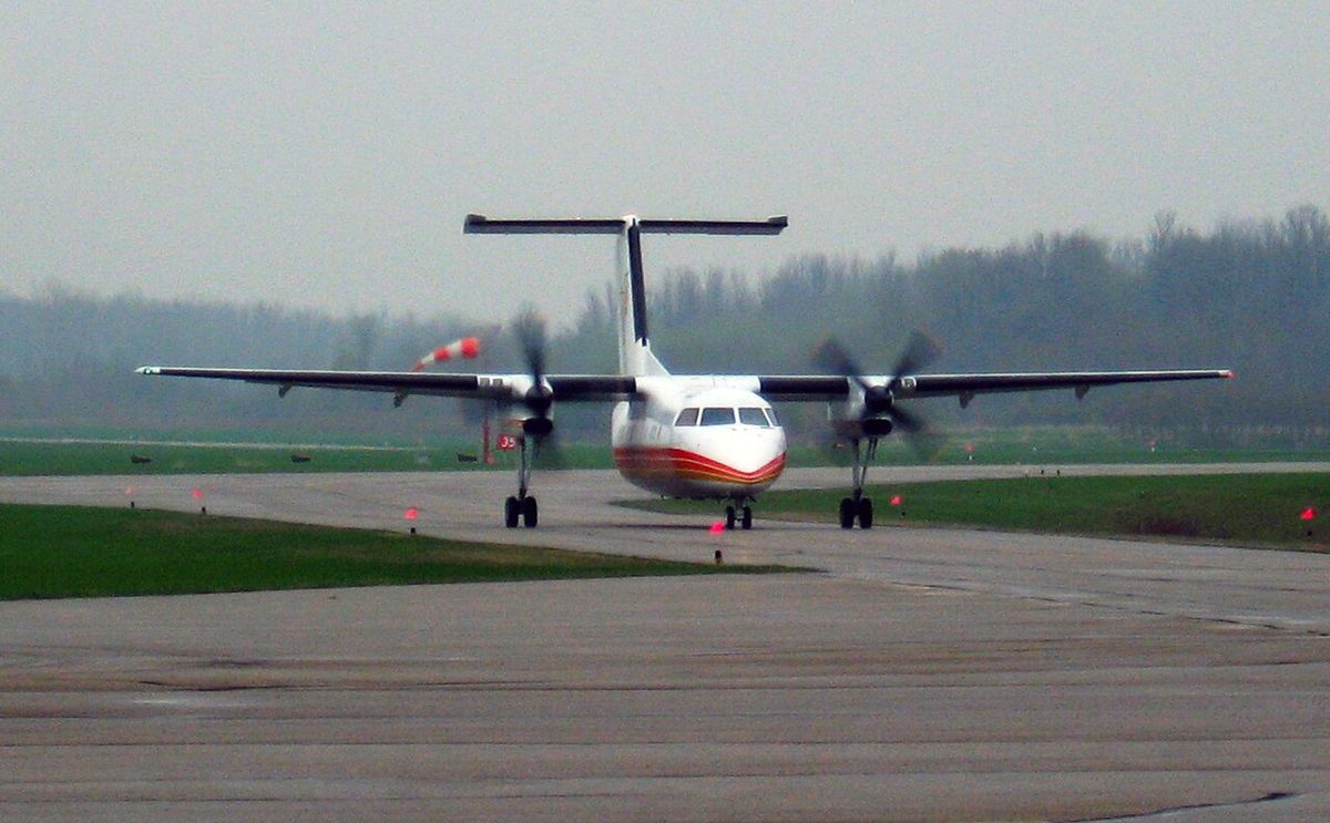 Air Creebec Dash-8-102 C-FCSK taxiing at Stratford Municipal Airport during the repatriation of Kashechewan flood evacuees on May 2, 2008.
