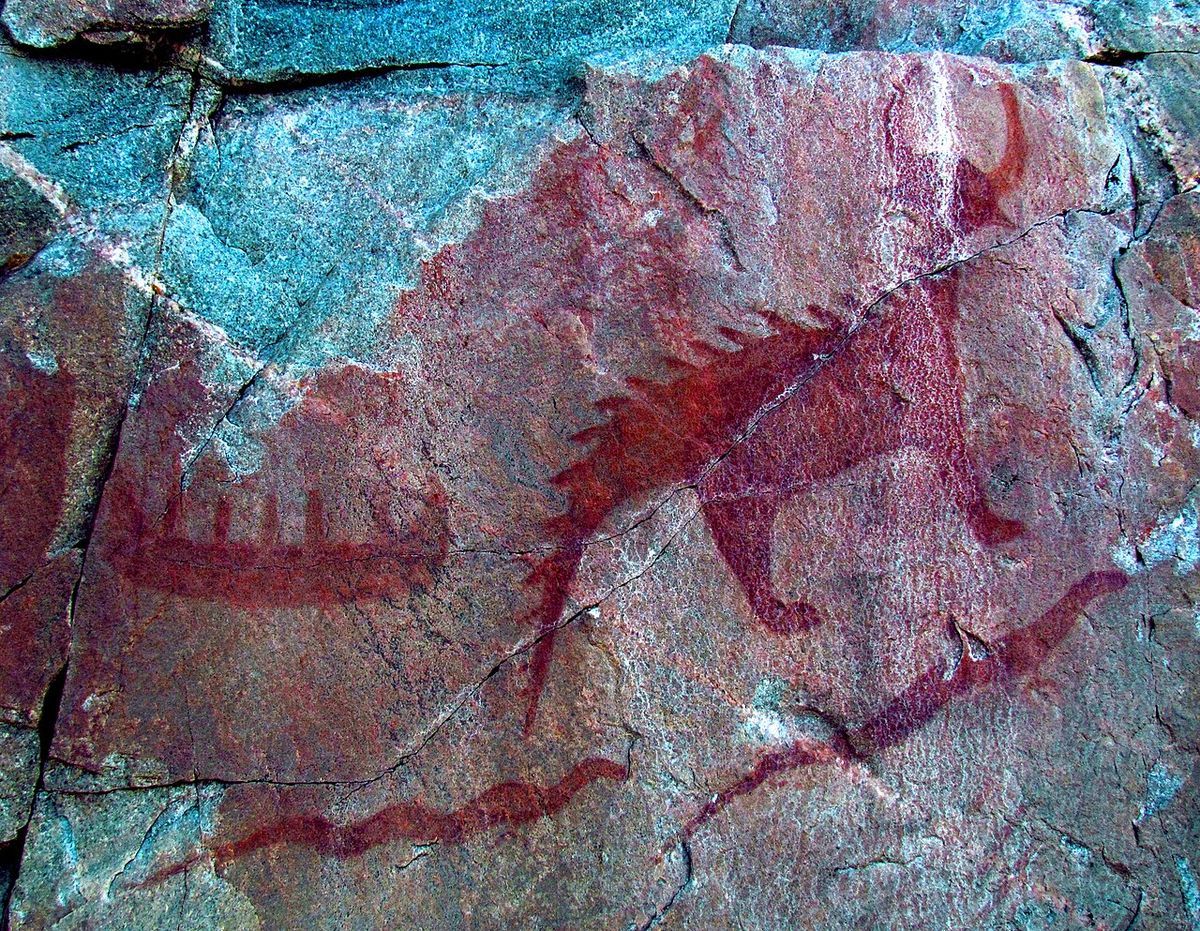 Canoe (top left), Michipeshu (top right), and two giant serpents (chignebikoogs), panel VIII, Agawa Rock, Lake Superior Provincial Park, Ont