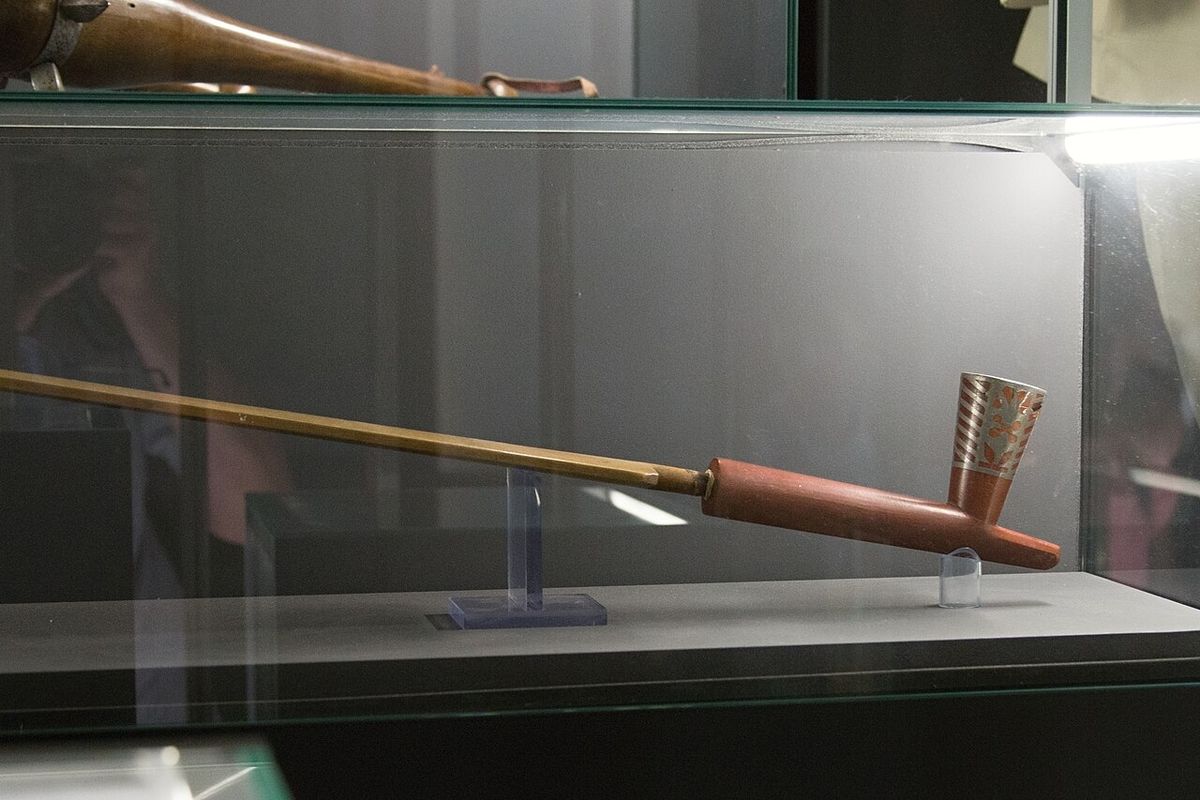 Ceremonial pipe. The bowl is made of soft red pipestone, also known as catlinite, with a carving and tin liner. Vojta Náprstek received the