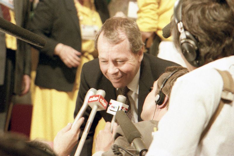 David Crombie, former Mayor of Toronto, speaks to reporters on the floor of the 1983 Progressive Conservative leadership convention.