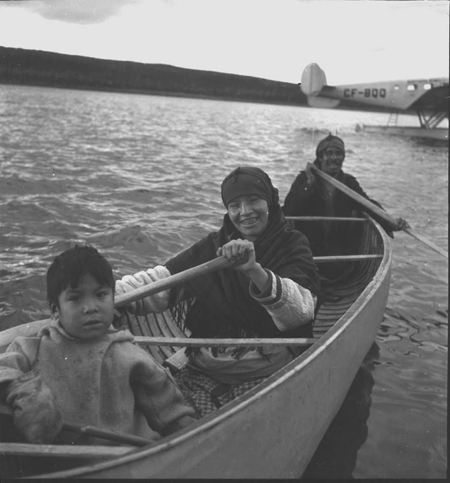 Inish (Einish) family in their canoe