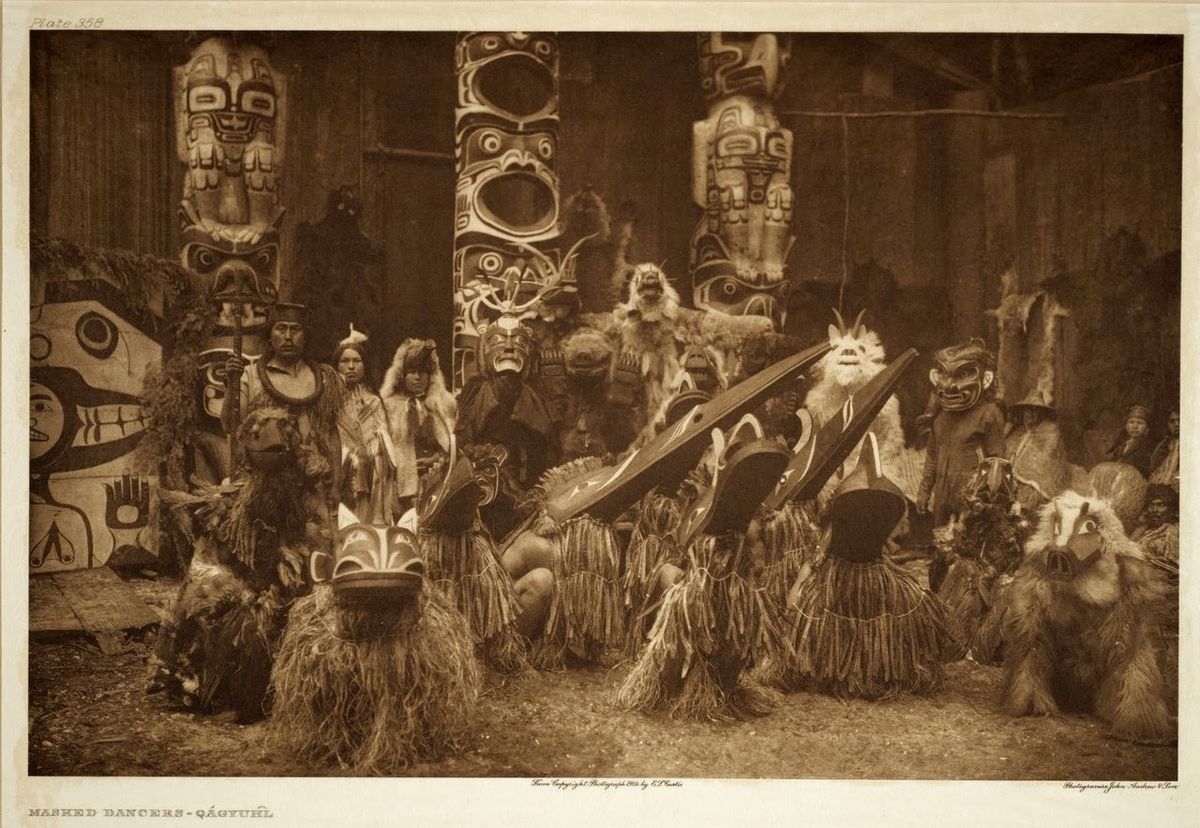 Showing of masks at Kwakwaka'wakw potlatch.