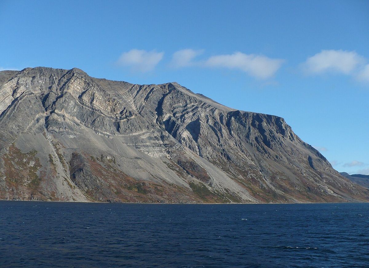 Near mouth of Saglek Fjord, Torngat Mountains National Park Reserve, Labrador, Canada. Extensive folding of rocks due to formation visible.
