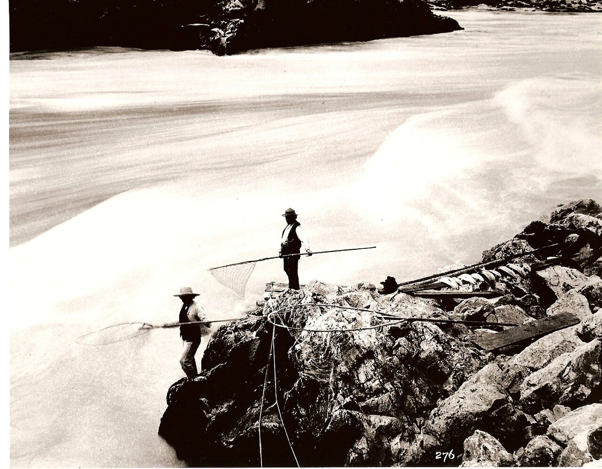 Stó:lō people fishing with traditional dipnets on the Fraser River