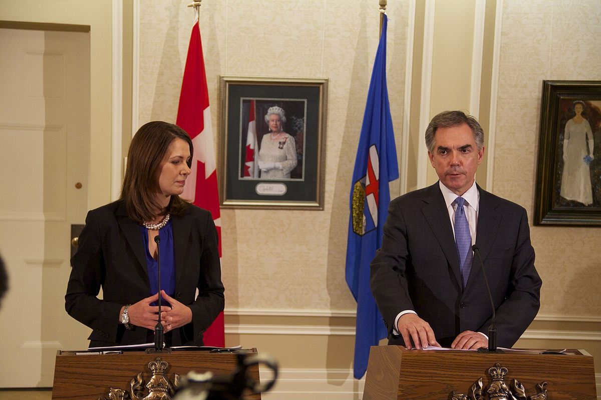 Jim Prentice and Danielle Smith announce the floor crossings of Ms. Smith and 8 Wildrose MLAs to the governing PC Party caucus.