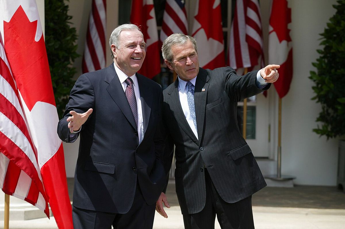 President George W. Bush and Canadian Prime Minister Paul Martin respond to questions from the press corps in the Rose Garden after a meetin